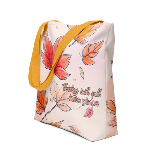 Tote bag with falling leaves design and motivational quote on a white background by Sweet and Savage.