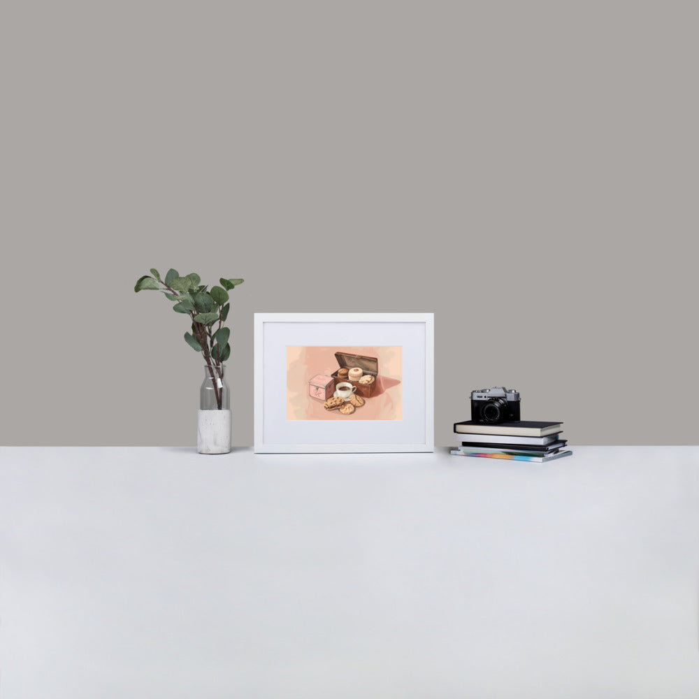 Framed poster illustrating a cookie box and a cup of coffee on a light pink background by Sweet and Savage.