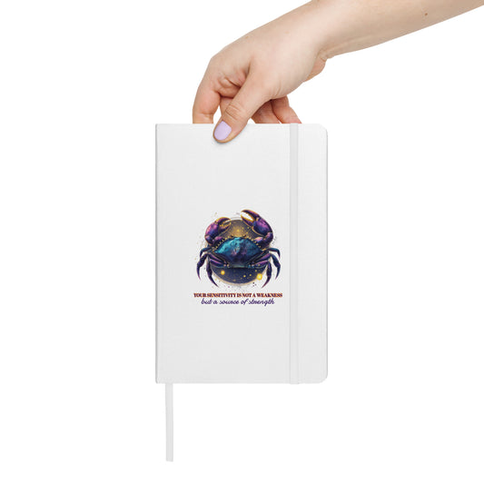 White hardcover notebook featuring a colorful, artistic Cancer zodiac crab design by Sweet & Savage.