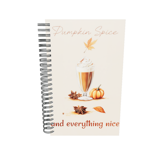 Spiral notebook with pumpkin spice design featuring a glass of pumpkin spice latte, pumpkins, and leaves on a beige background by Sweet and Savage.