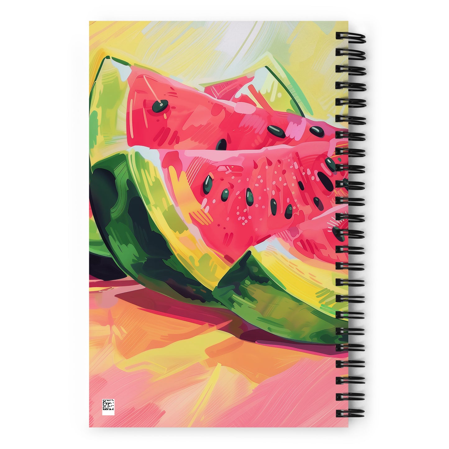 Spiral notebook with colorful watermelon design on a white background.