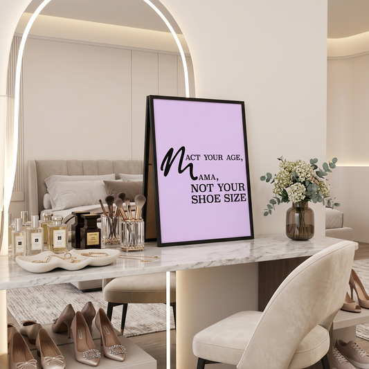 Modern interior with a mirror, decor items, and a framed quote 'Act Your Age Mama, Not Your Shoe Size' on a marble surface.