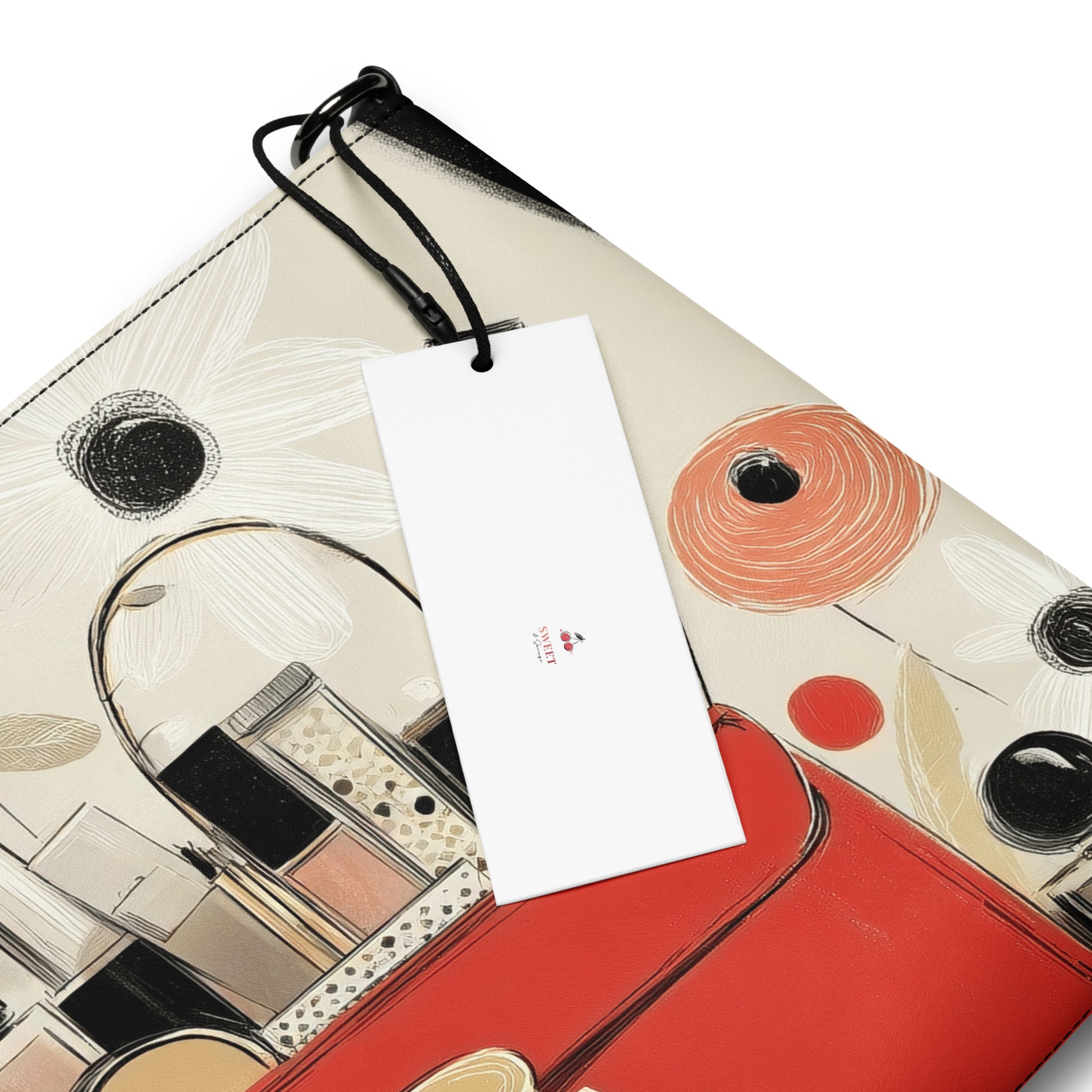 A close up crossbody bag with a print design that features luxurious makeup items along with a cherry logo by Sweet and Savage. 