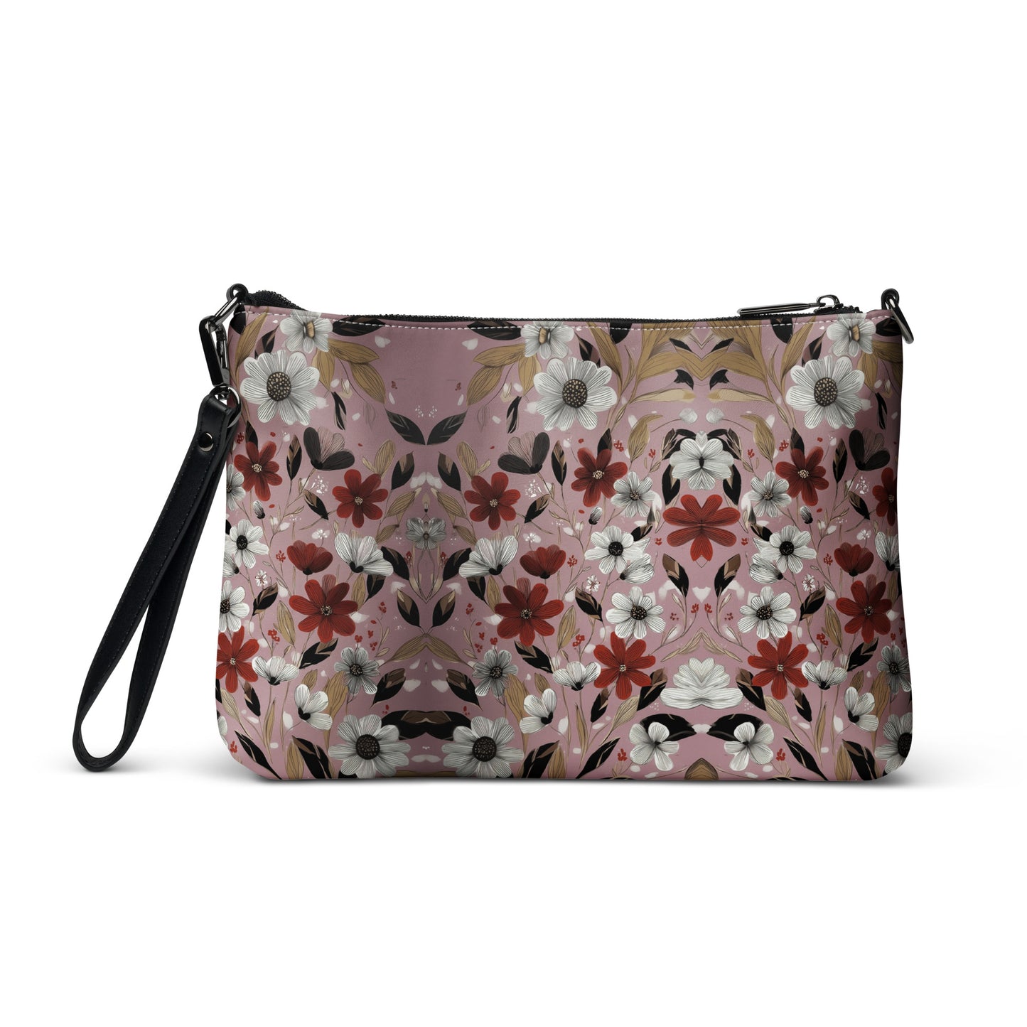 Floral patterned crossbody bag with black strap on a white background. 