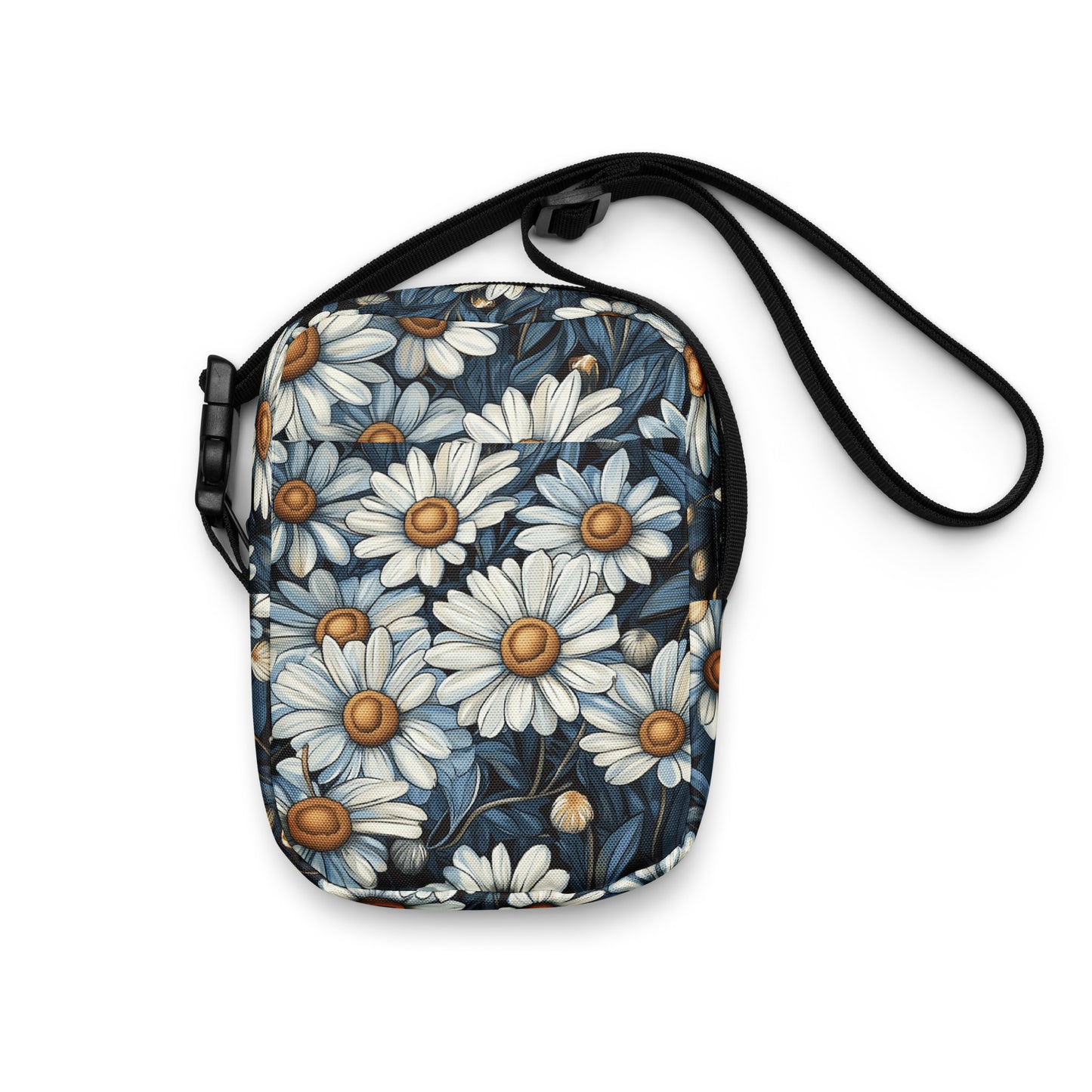 Floral patterned crossbody with a strap on a white background. 