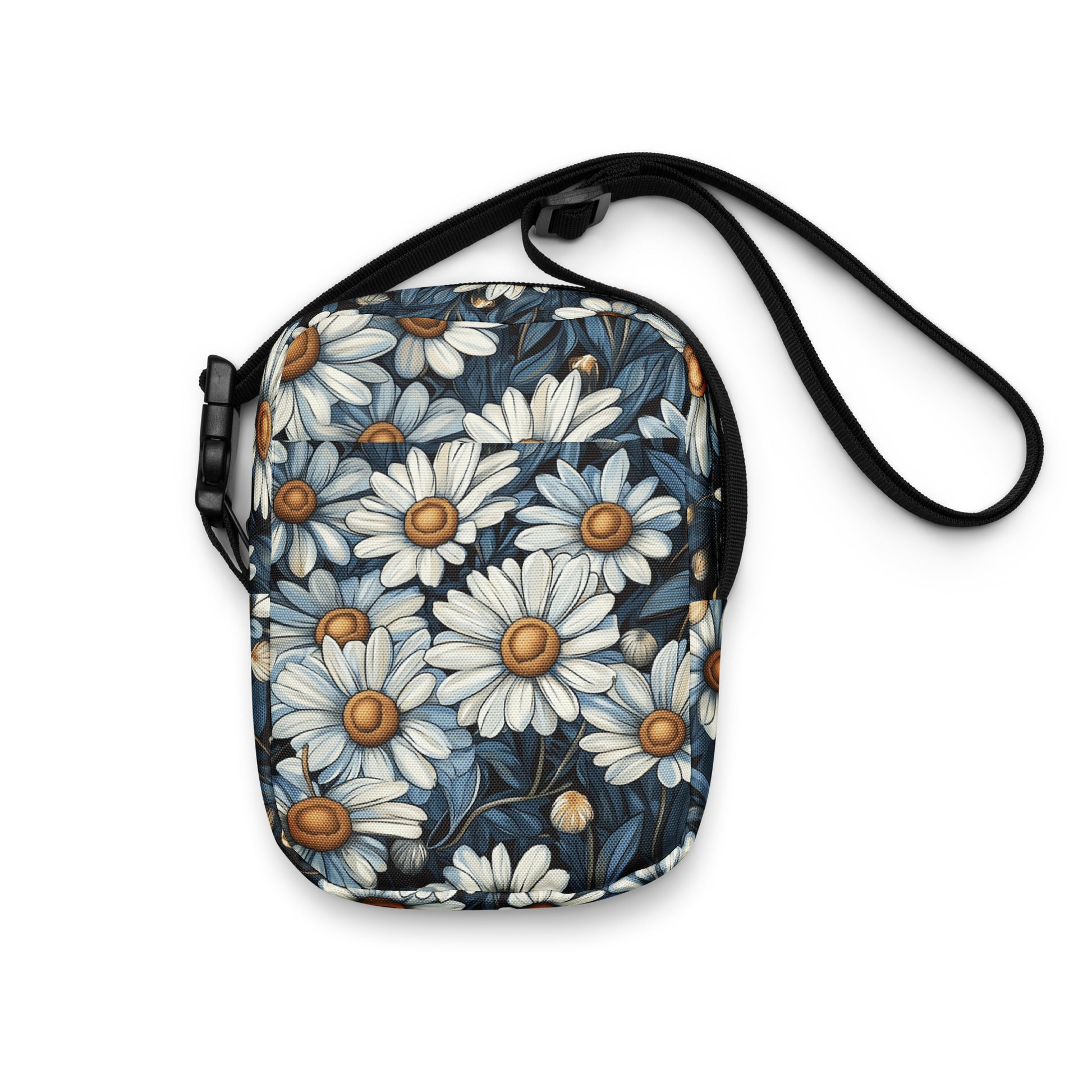 Floral patterned crossbody with a strap on a white background. 