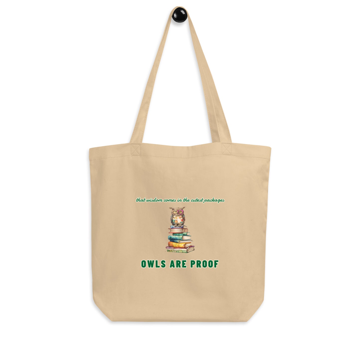 Cream-colored organic cotton tote bag featuring a stack of books and a wise owl illustration.