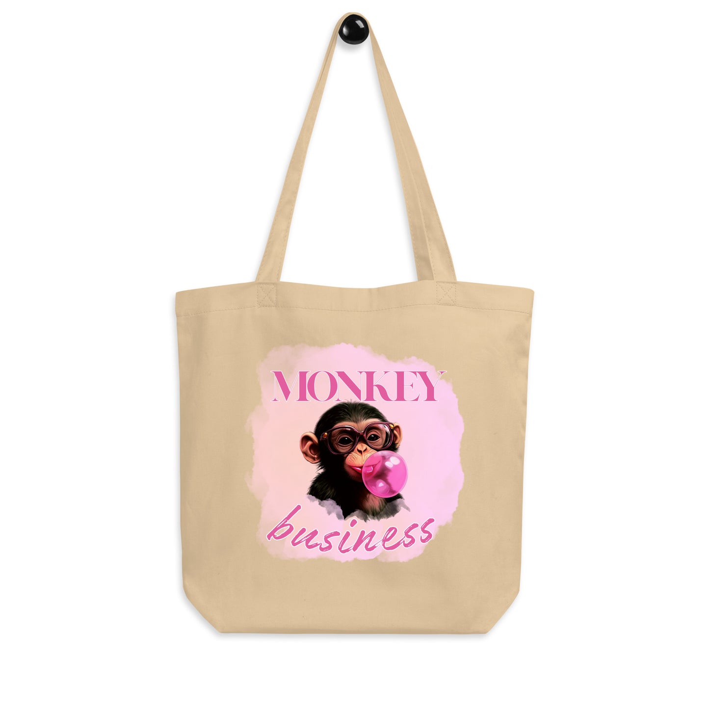 Sustainable oyster cotton tote bag featuring the 'Monkey Business' chimpanzee artwork, durable and spacious for eco-conscious daily use