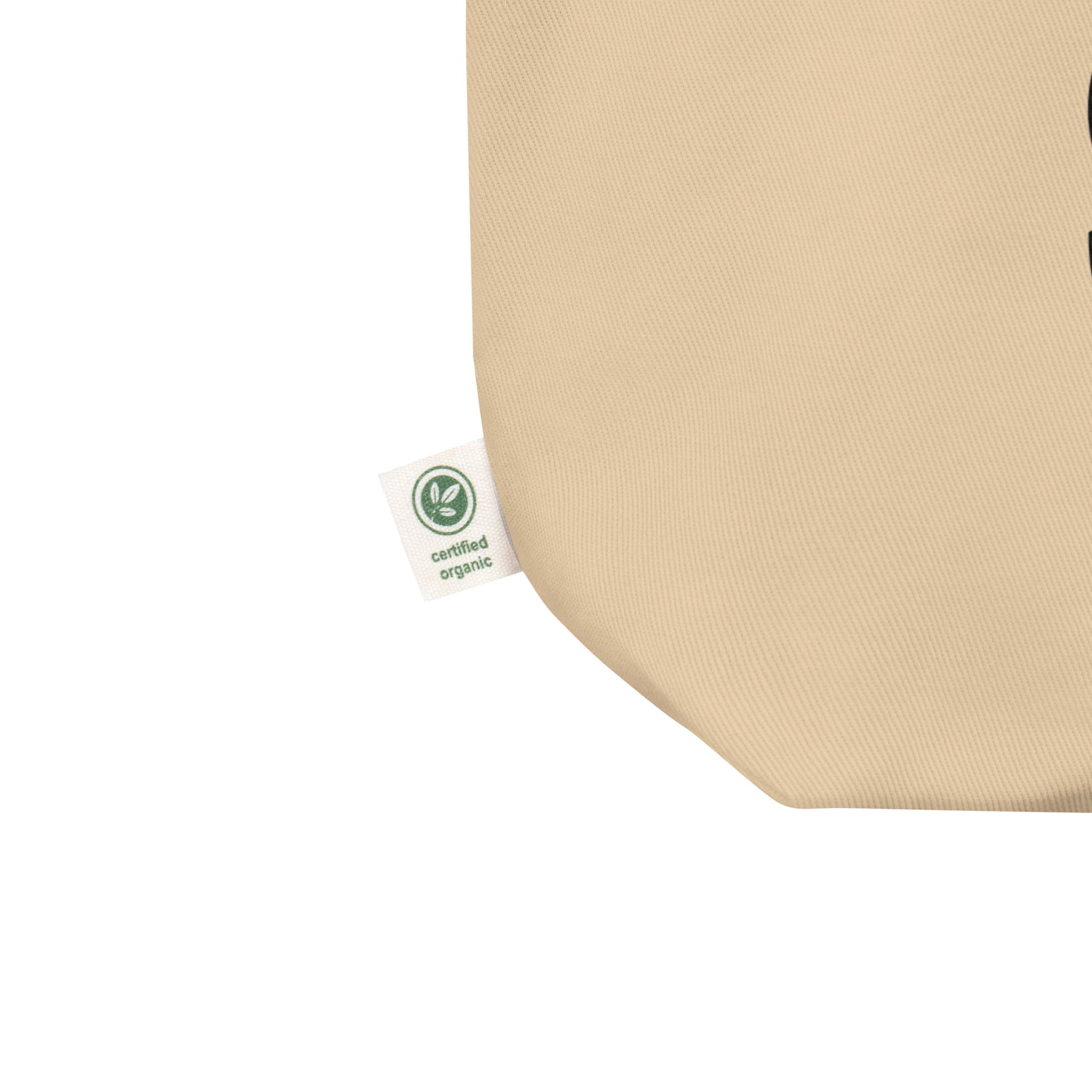 A close up of an organic cotton tote bag with the sign for certified organic. 