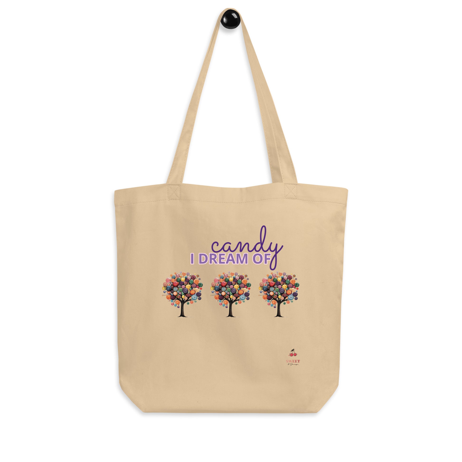 Cream organic cotton tote bag featuring three colorful candy trees and "Candy I Dream of" text.