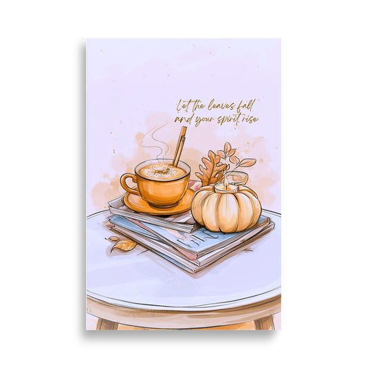An autumn-themed art print featuring a watercolor illustration of a cozy cup of coffee on a saucer, a small pumpkin, and stacked books on a round table, with the text 'let the leaves fall and your spirit rise' written in gold script.