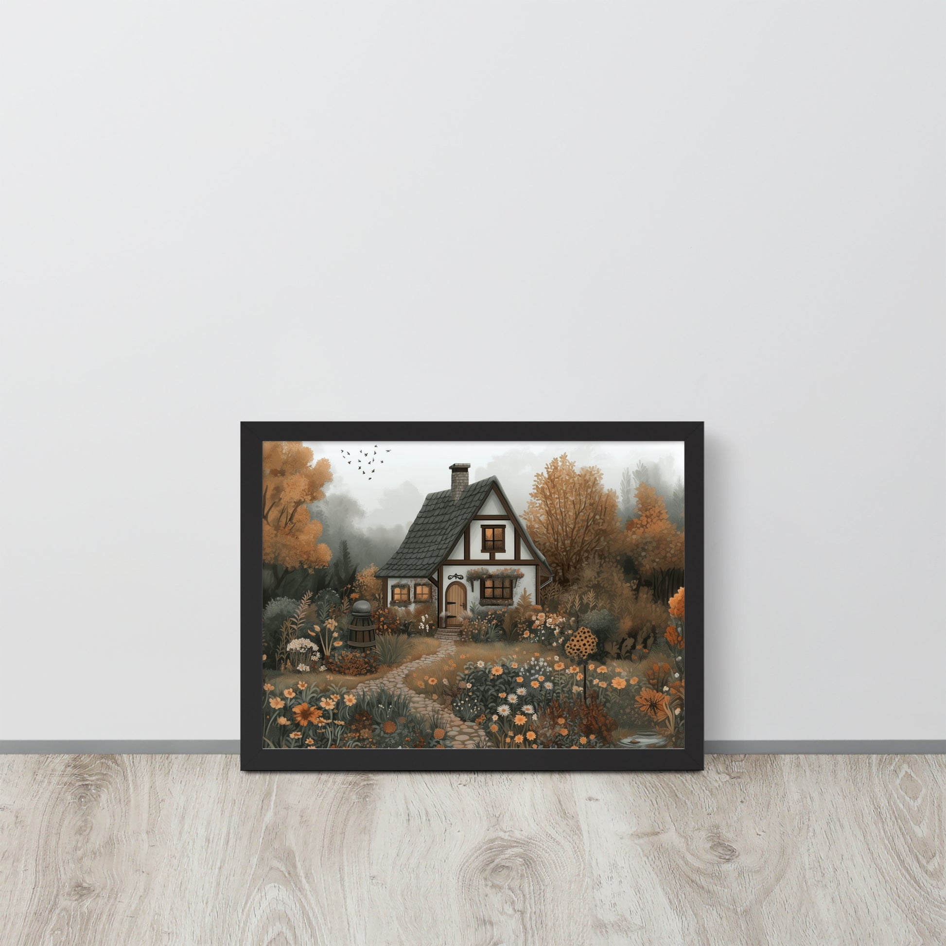 Framed poster of a cottage in a forest with autumn colors by Sweet and Savage. 