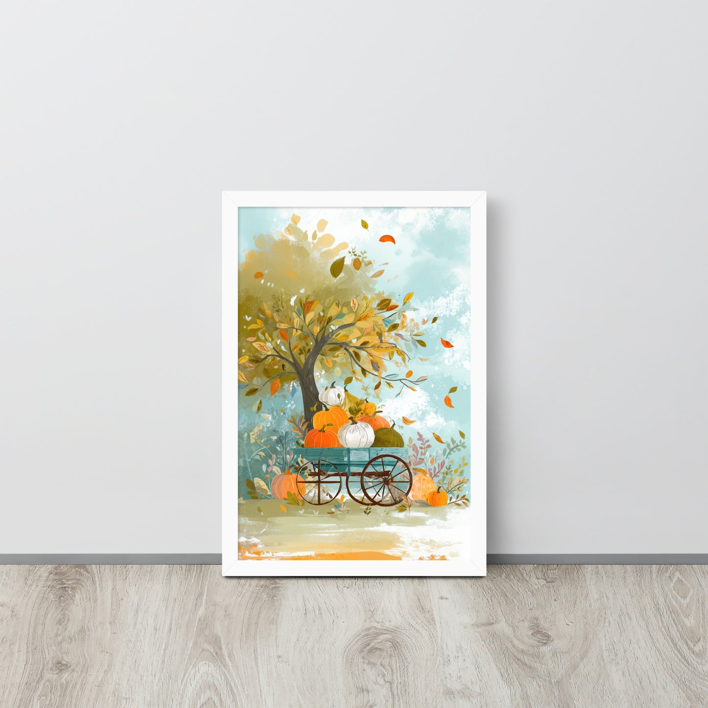 Framed poster of a tree with pumpkins and a cart on a light gray wall by Sweet and Savage. 