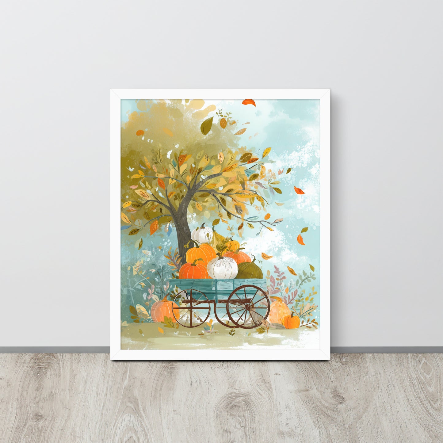 Framed poster of a tree with pumpkins and a cart on a light gray wall by Sweet and Savage. 