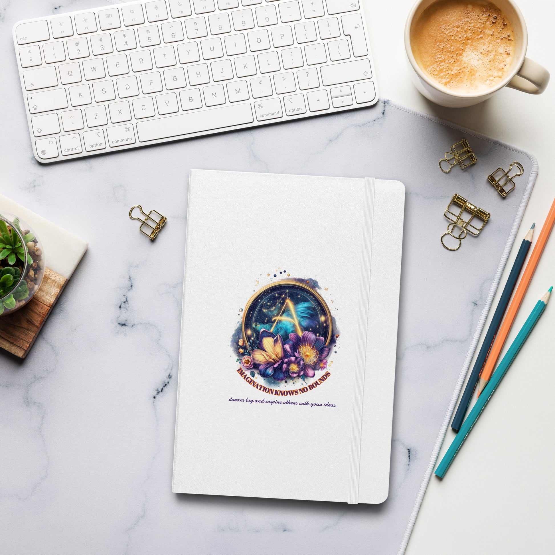 Hardcover notebook with Aquarius zodiac symbols and floral motifs.