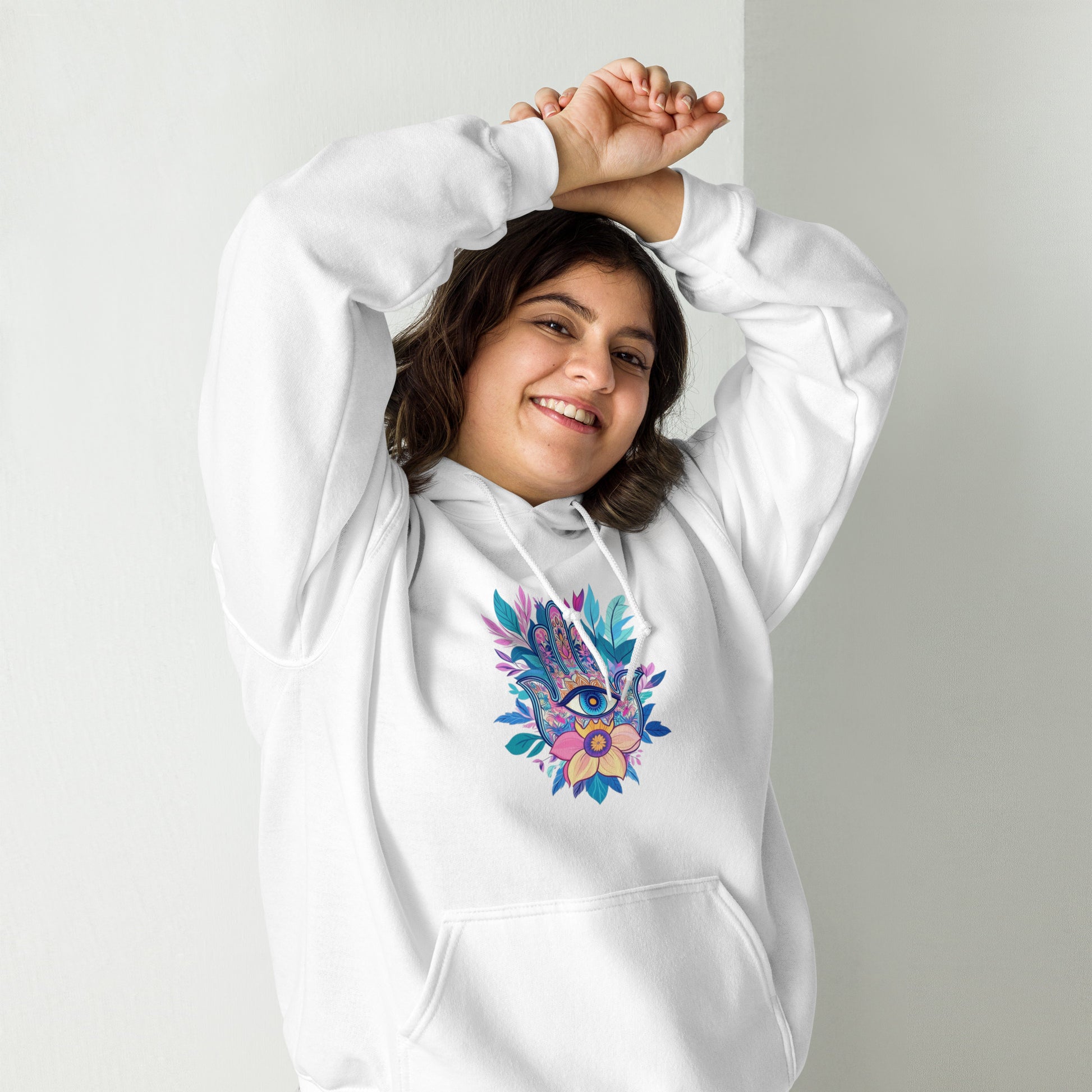 Woman wearing a white Sweet & Savage cosy hoodie with a colorful graphic, premium soft cotton blend, sustainable made-to-order apparel.