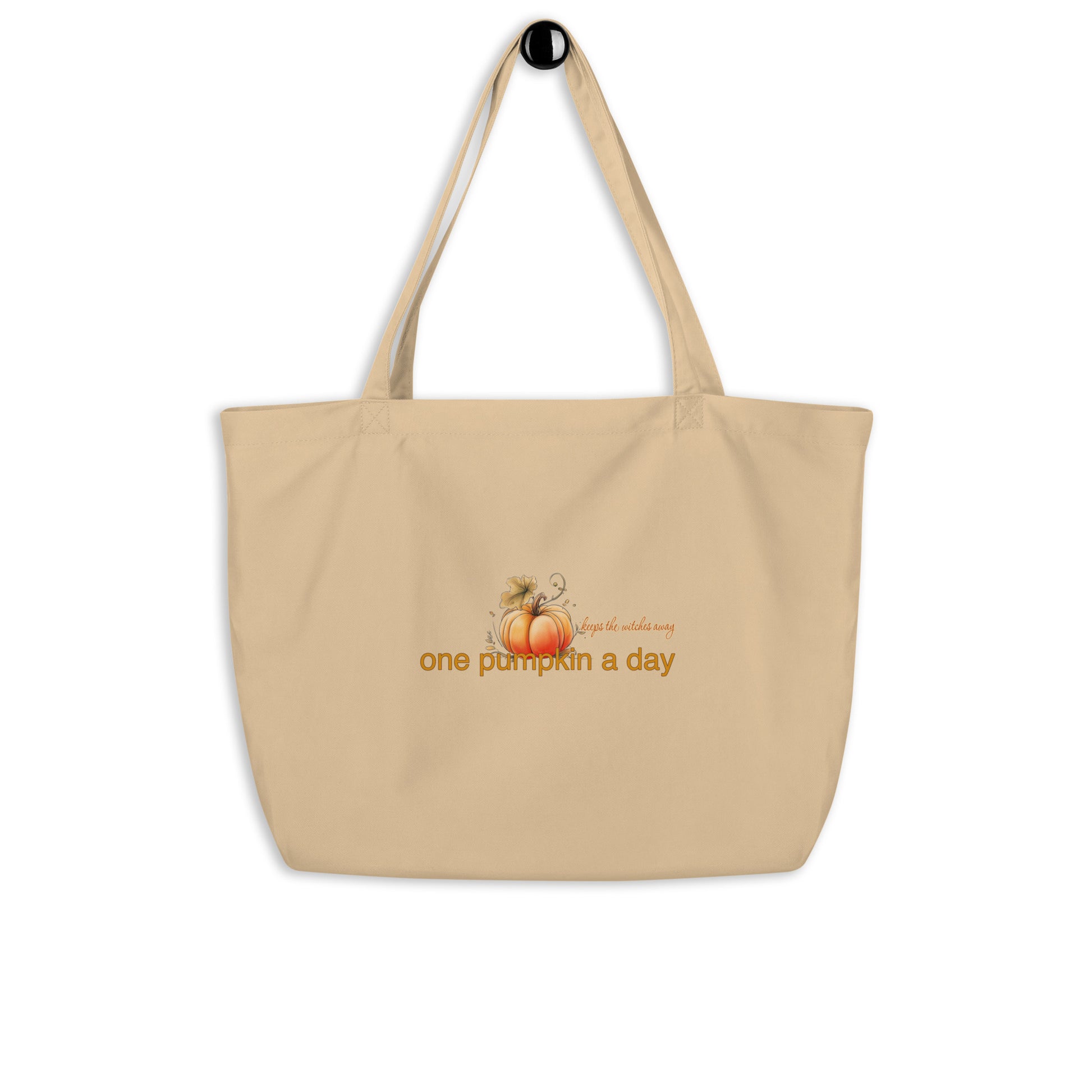 Sweet & Savage Eco Tote Bag, our cream-colored organic cotton tote features a 'one pumpkin a day' graphic with a small pumpkin illustration, showcasing its large shopper capacity.