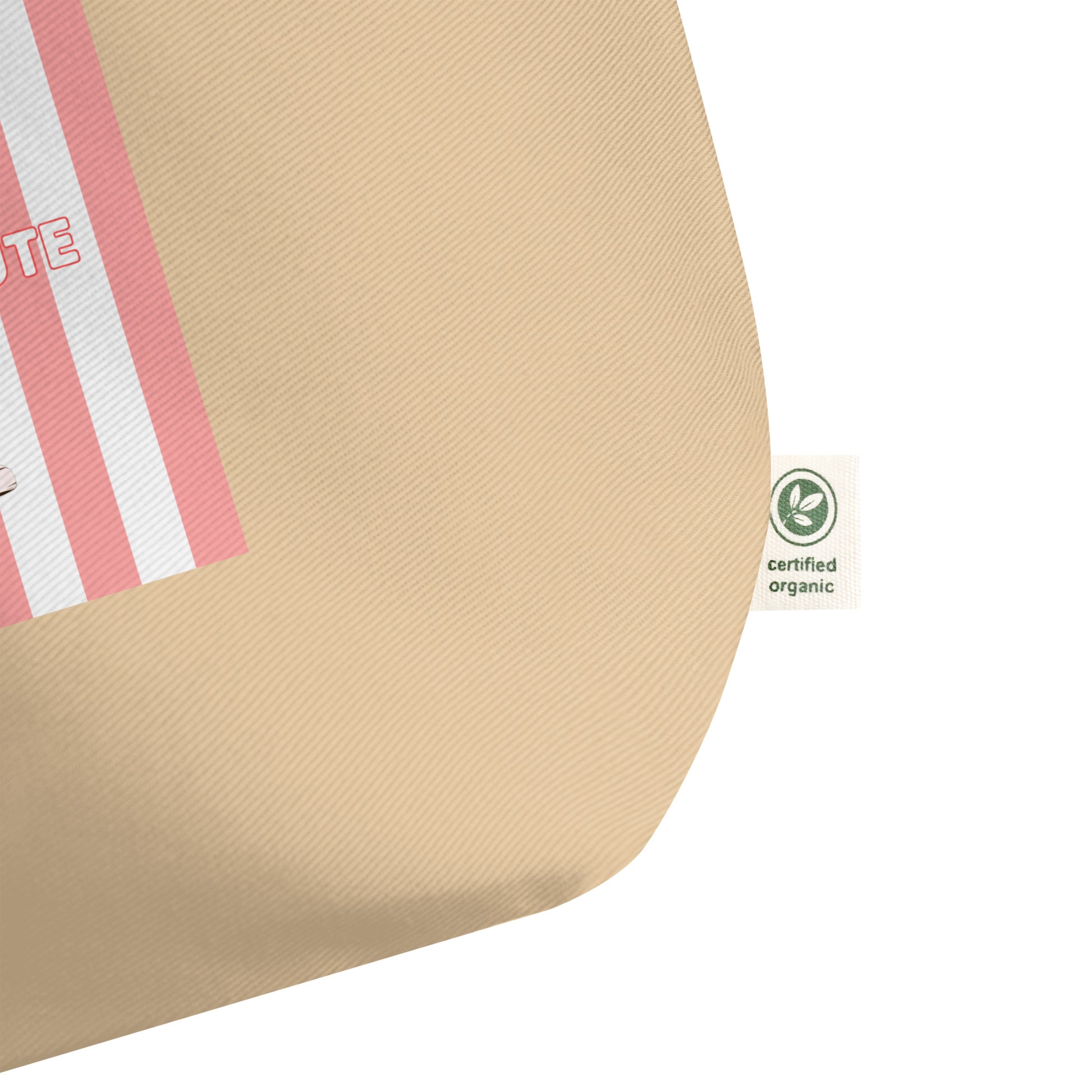 Beige fabric with red and white stripes and a green organic certification label on a white background