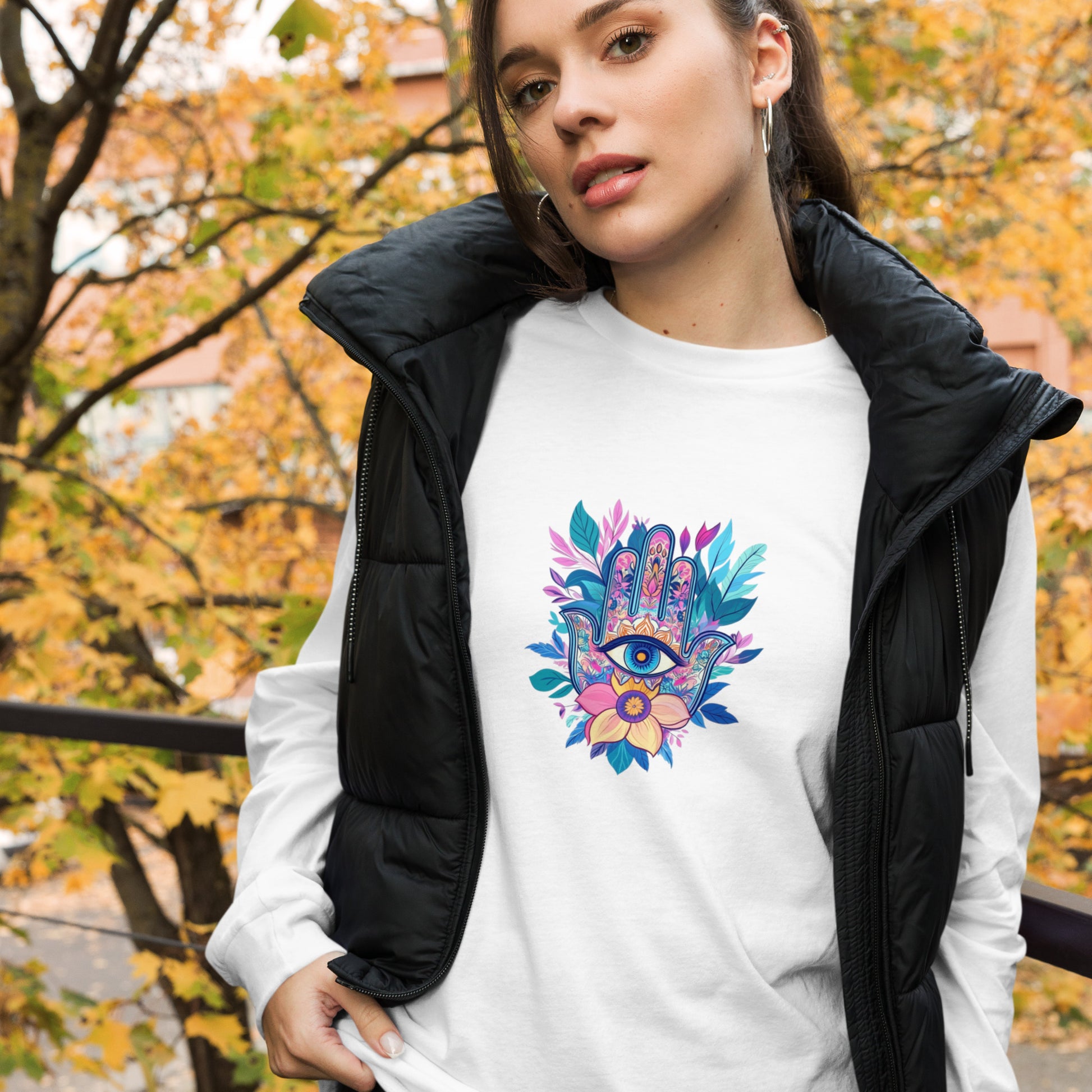 Women's white long-sleeve t-shirt with a colorful Hamsa hand graphic, premium combed ring-spun cotton, sustainable fashion by Sweet & Savage.