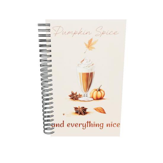 Spiral notebook with pumpkin spice design featuring a glass of pumpkin spice latte, pumpkins, and leaves on a beige background by Sweet and Savage. 
