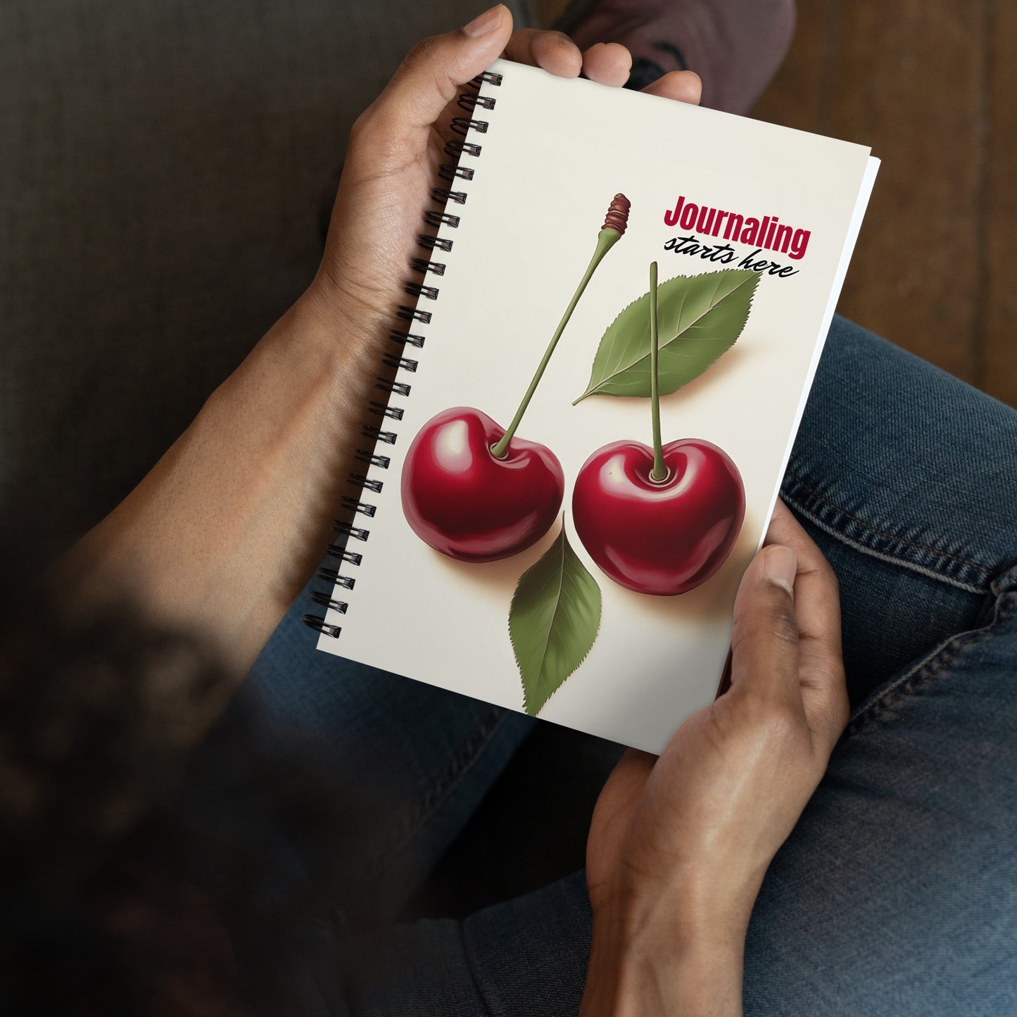 Spiral notebook featuring a vibrant cherry botanical design and the text "Journaling Starts Here" by Sweet & Savage