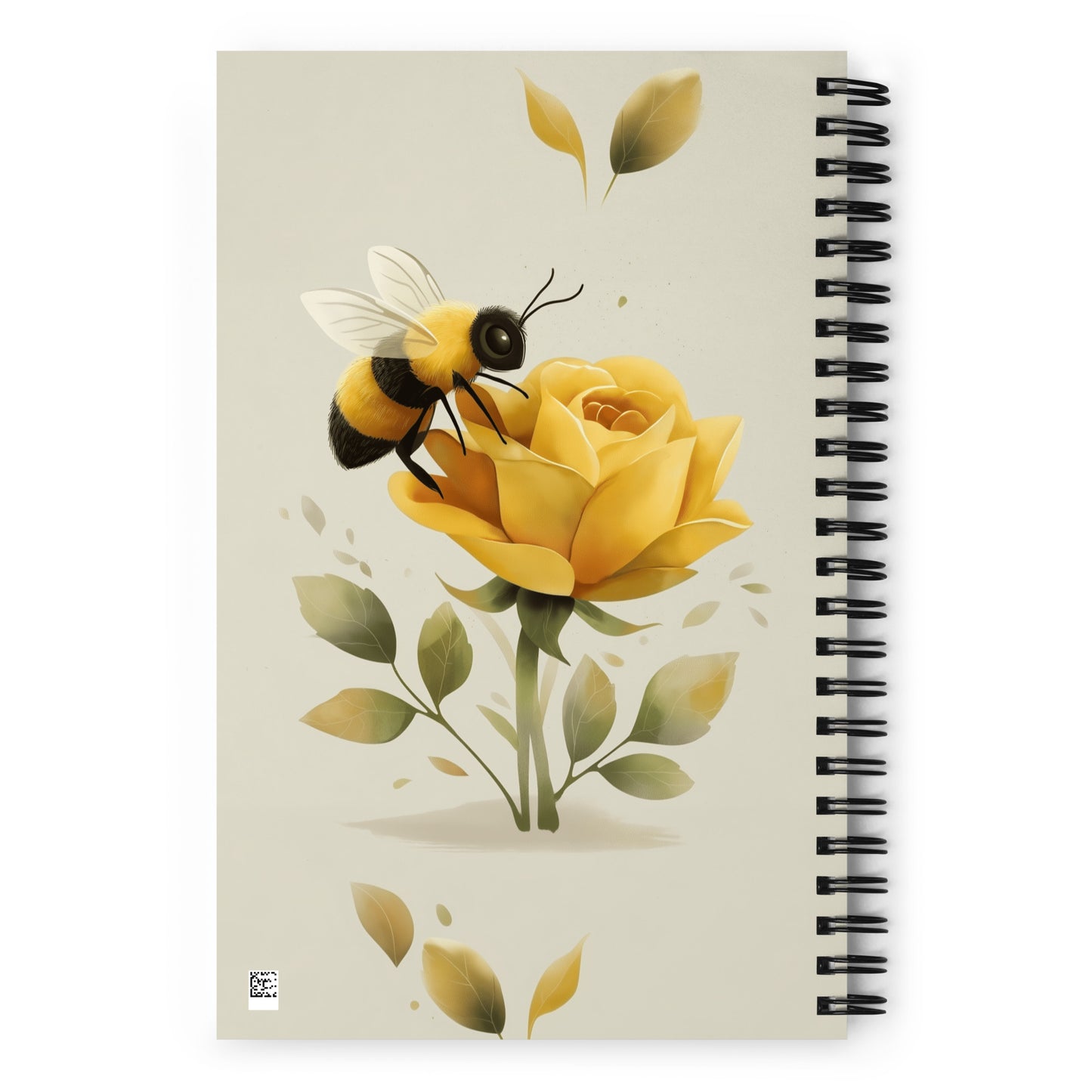 Spiral notebook with a design of a bee on a yellow rose with the text 'Always carry a notebook', on a white background.