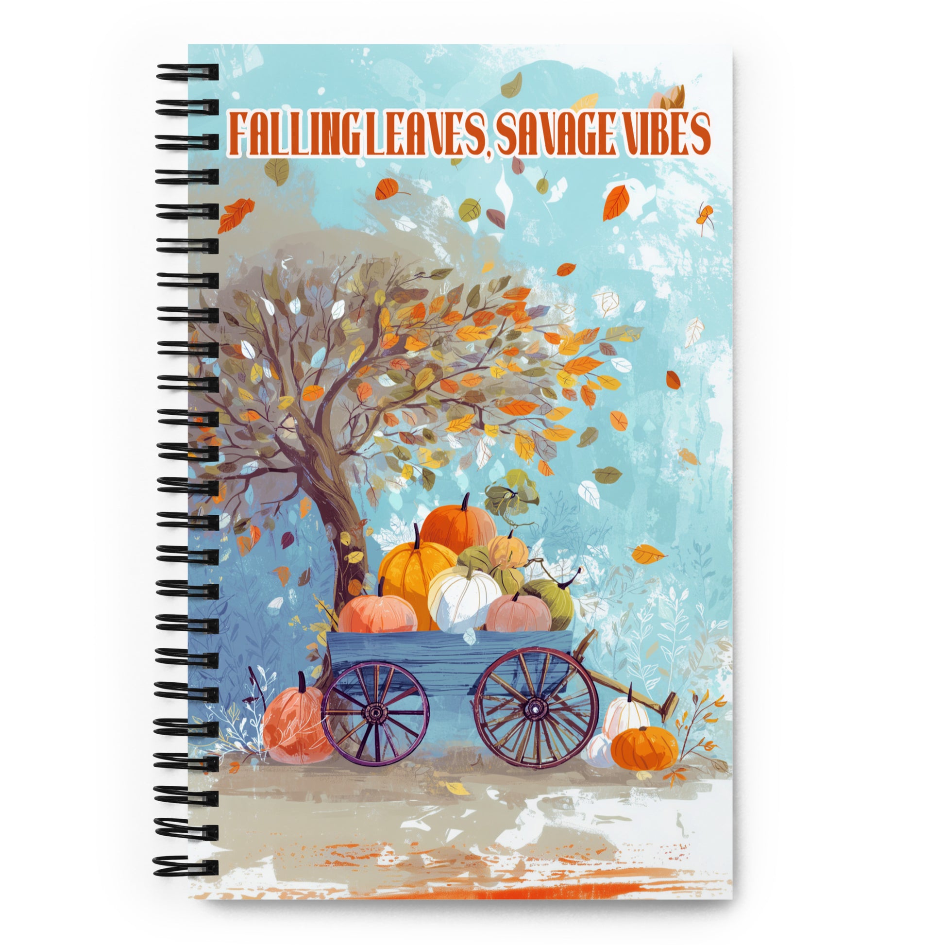 Spiral notebook with autumn design featuring pumpkins and a tree, titled 'Falling Leaves Savage Vibes'.