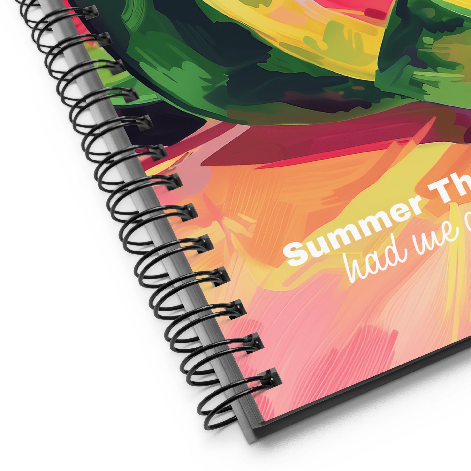 Close-up image of a corner of a spiral notebook with a watermelon design. 