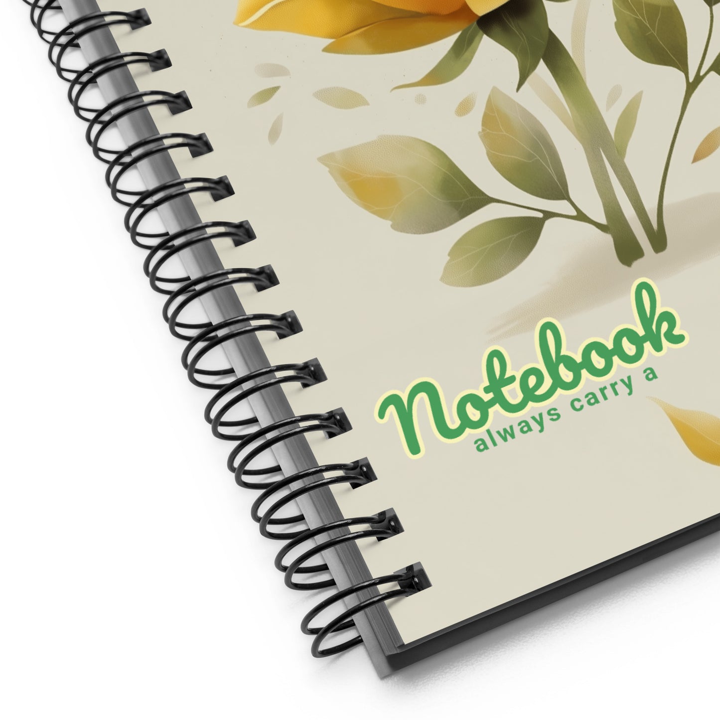 Close up of a spiral notebook with the words 'Always Carry a Notebook' 