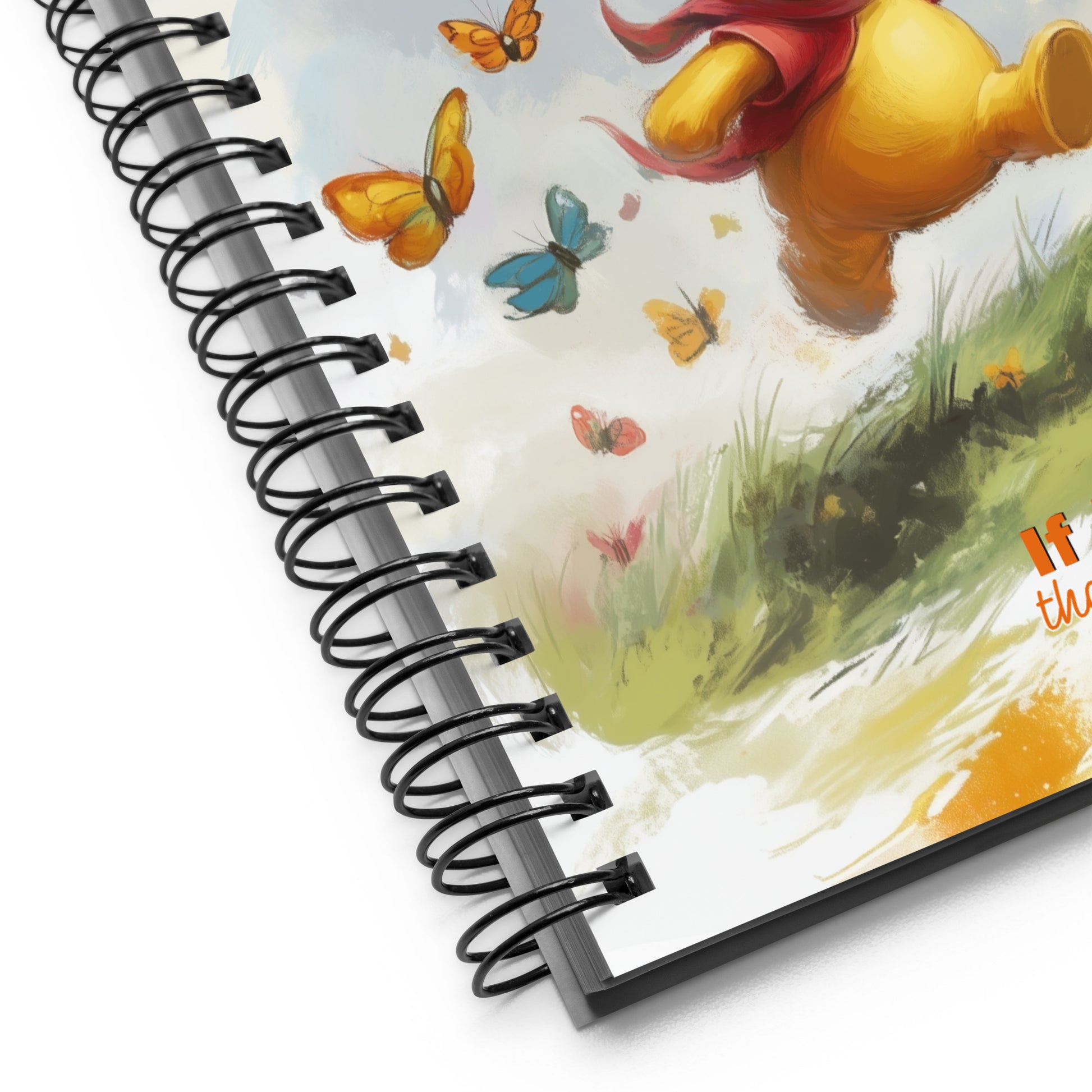 Close up of Winnie the Pooh spiral notebook. 
