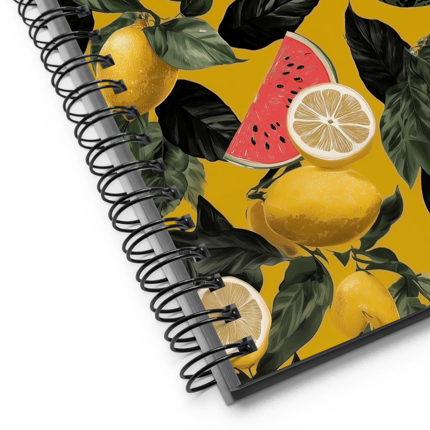 Close up of a spiral notebook with a watermelon and lemons design. 