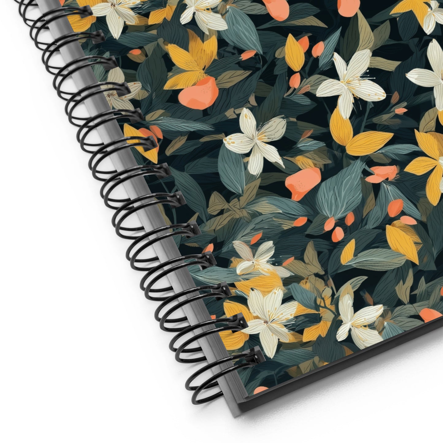 Spiral notebook with mint and jasmine design and spiral binding on a white background. 