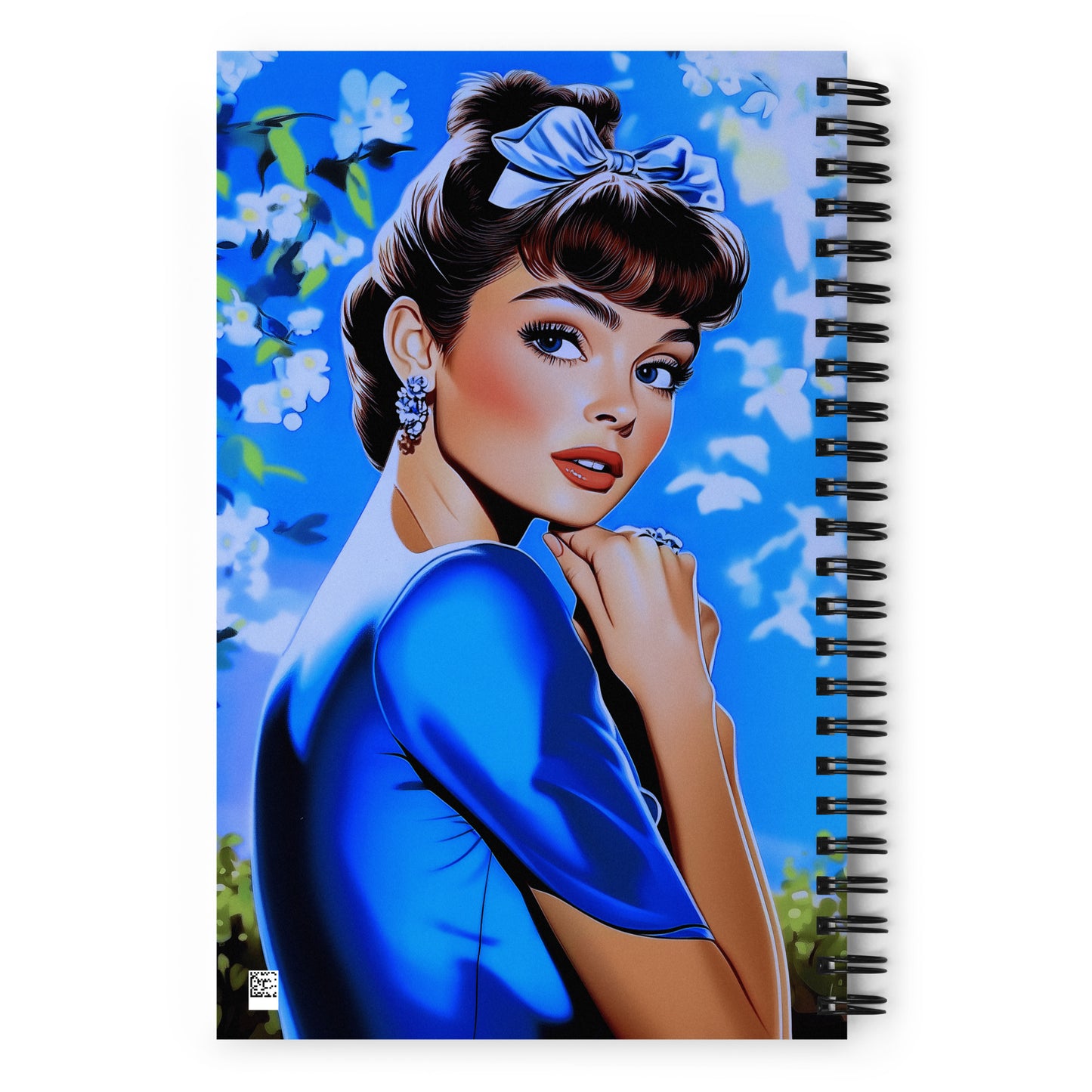 Spiral notebook with a secret garden floral and style icon graphic.