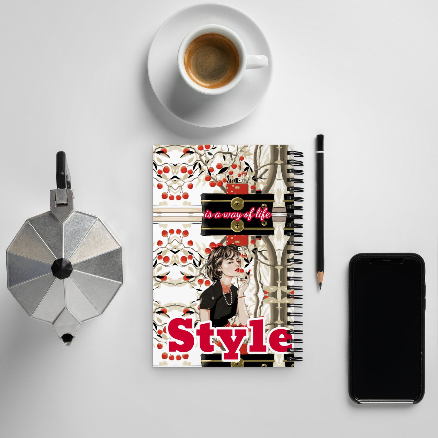 Soft-touch spiral notebook with "Style" graphic next to a cup of coffee.