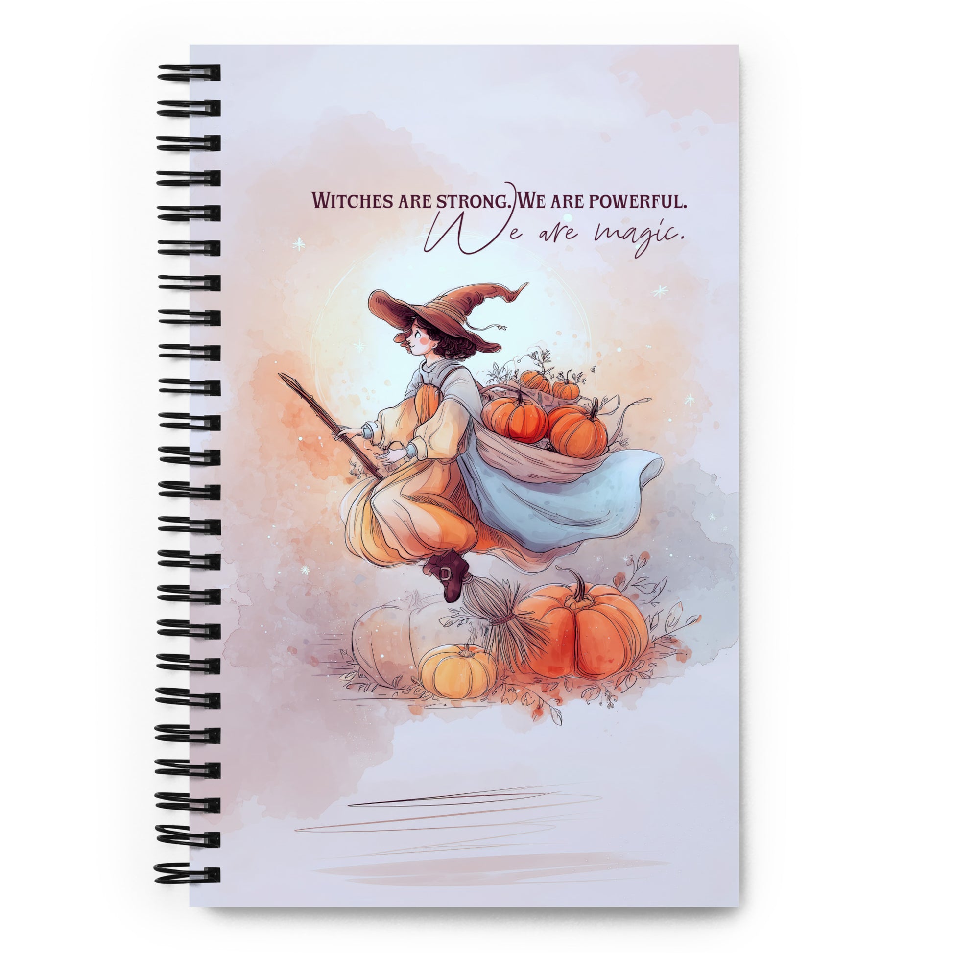 Spiral Notebook with a witch and pumpkins design on the cover by Sweet and Savage. 