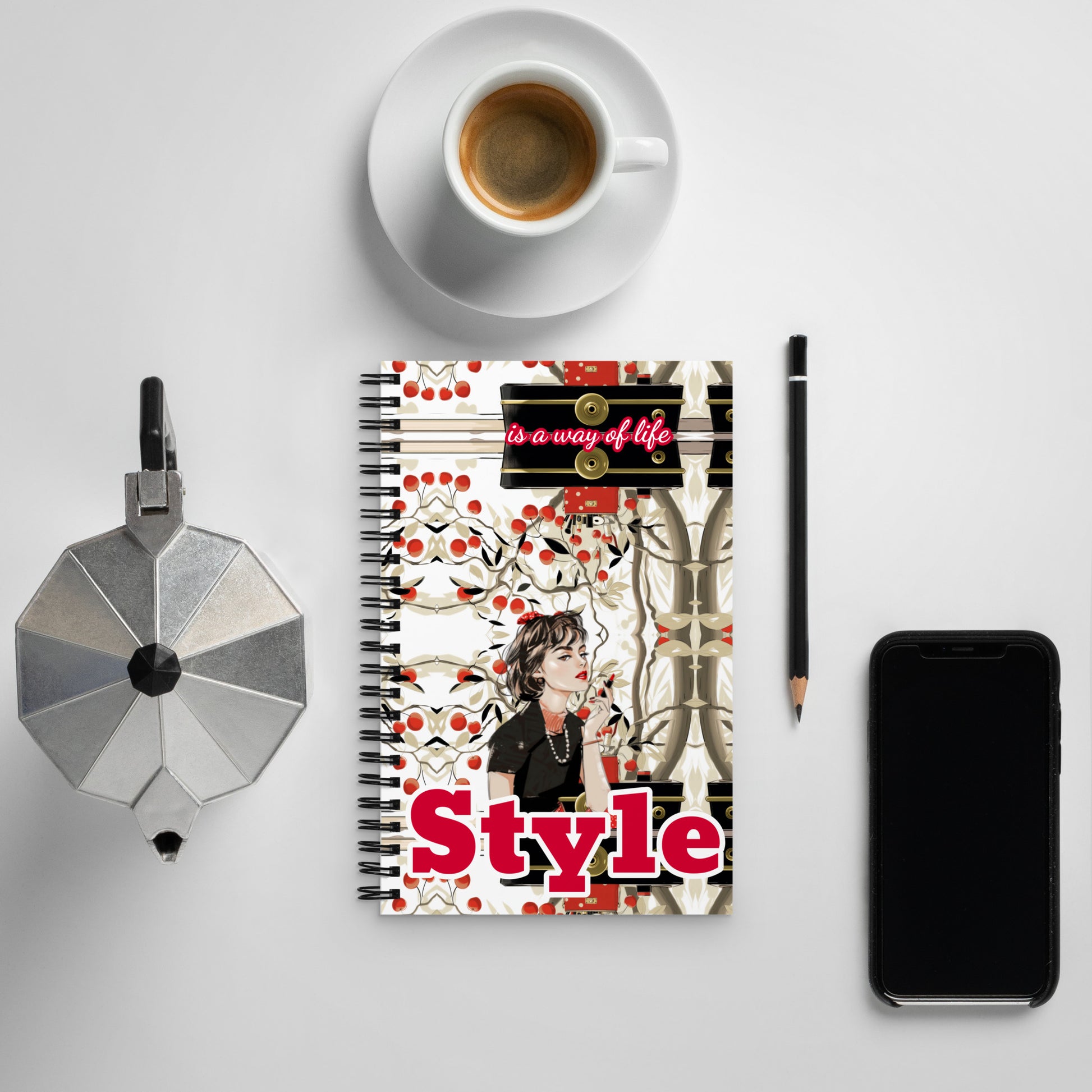 Soft-touch spiral notebook with "Style" graphic next to a cup of coffee.