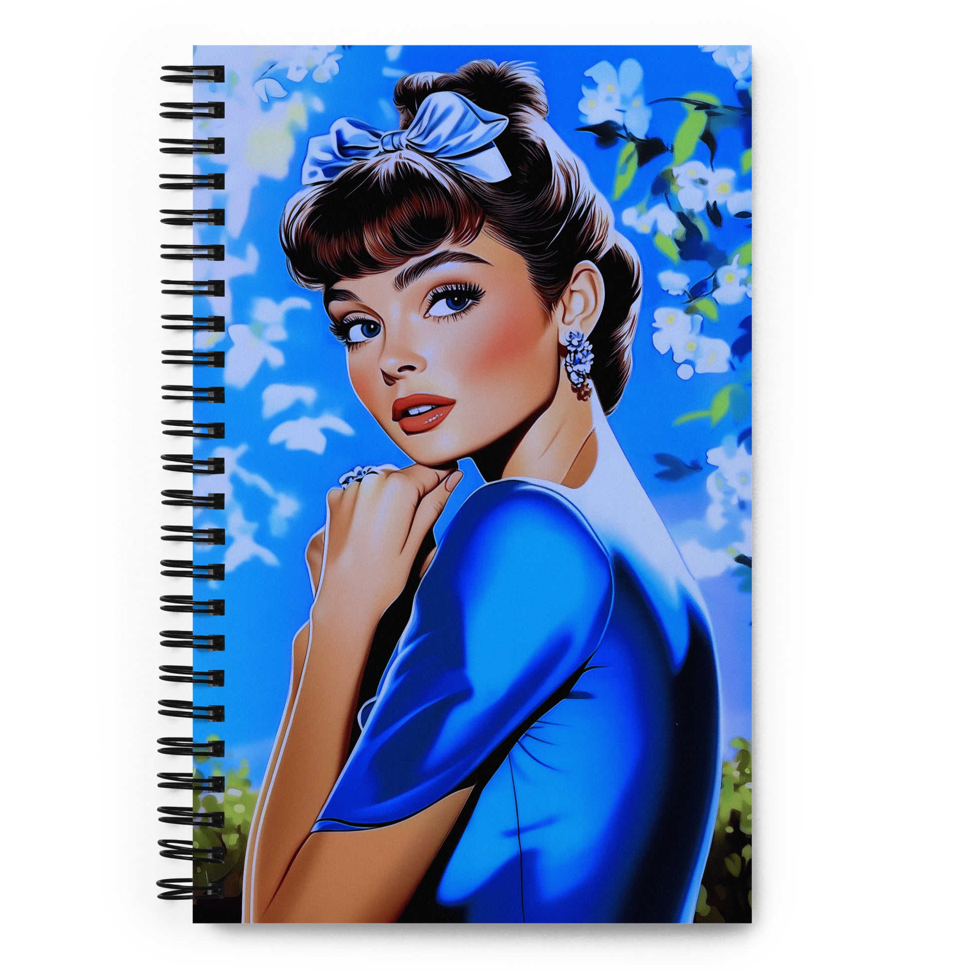 Spiral notebook with a secret garden floral and style icon graphic.