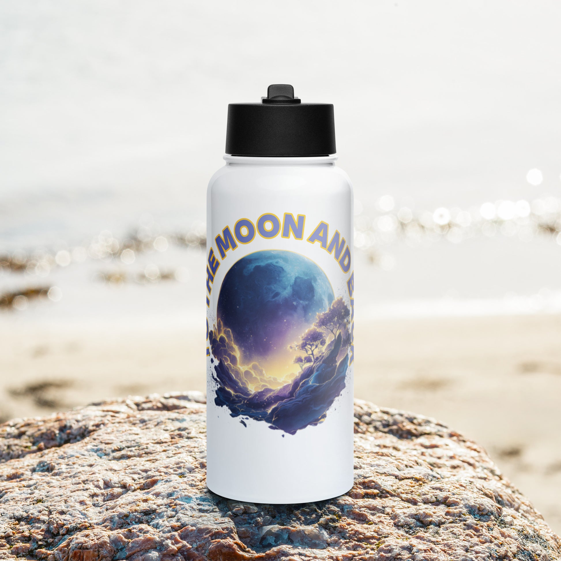 Large white stainless steel water bottle featuring a circular celestial art print of a moon and clouds, styled on a beach setting.