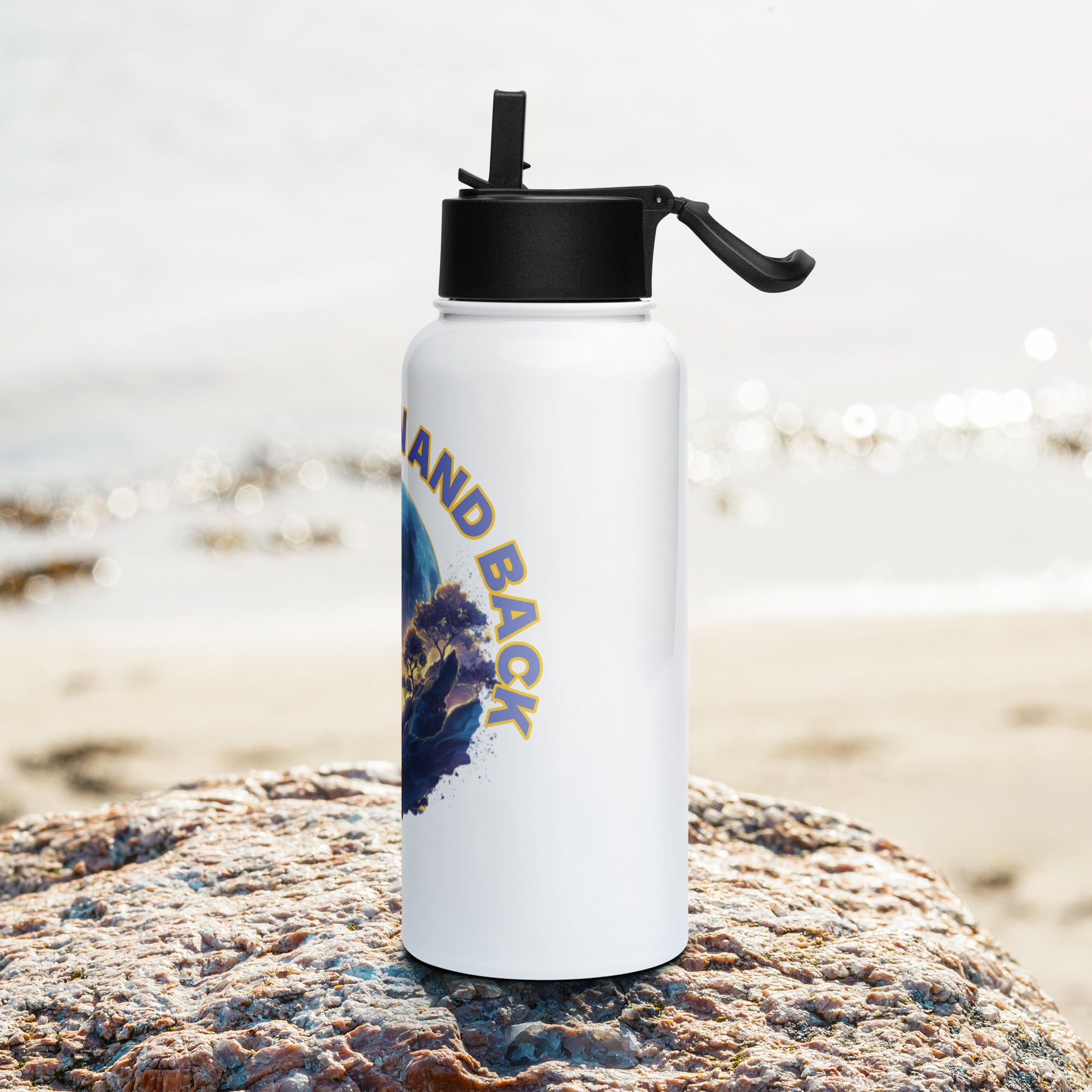 Large white stainless steel water bottle featuring a circular celestial art print of a moon and clouds, styled on a beach setting.