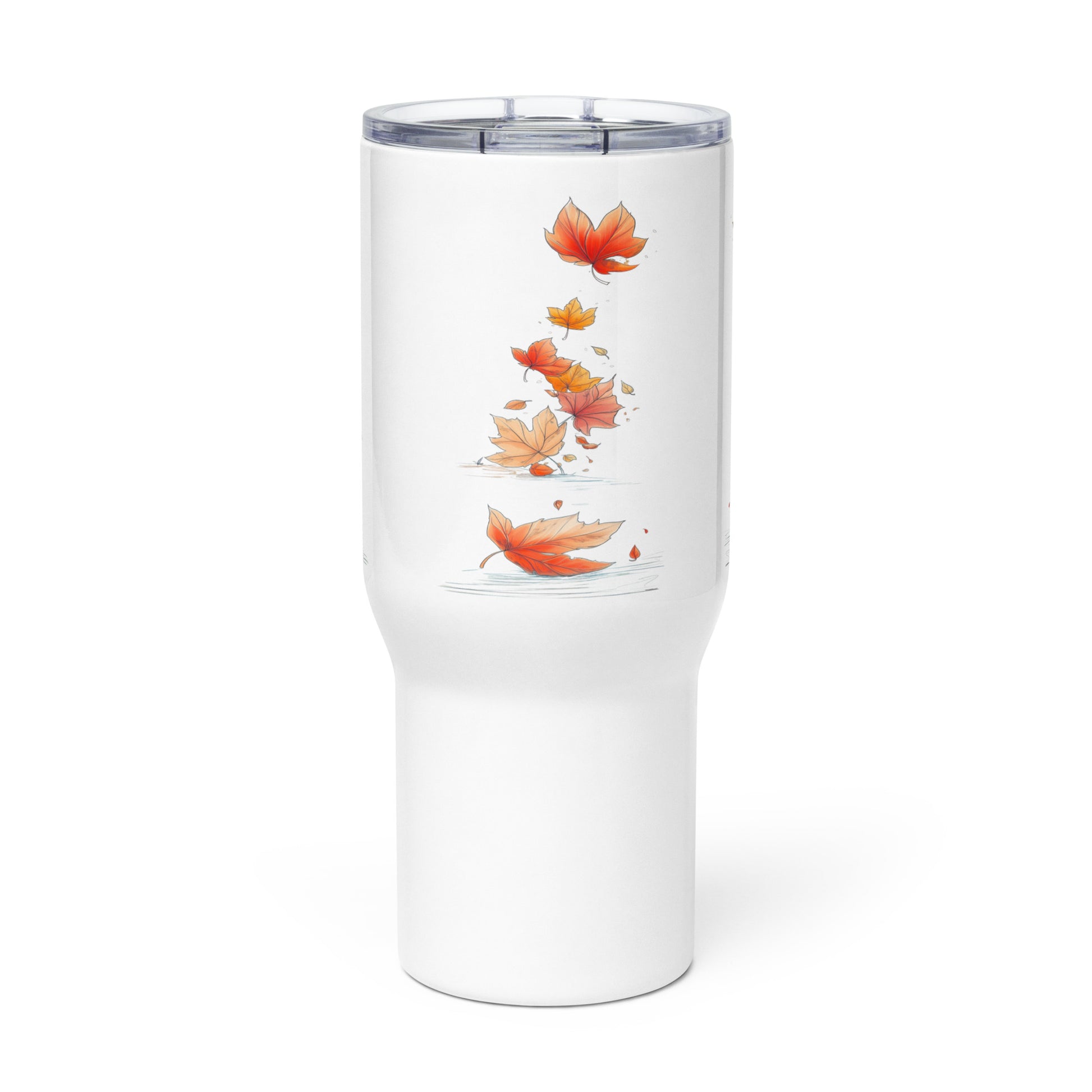 A white insulated travel tumbler with a clear lid, featuring a vertical graphic print of falling orange and yellow autumn leaves on the front.