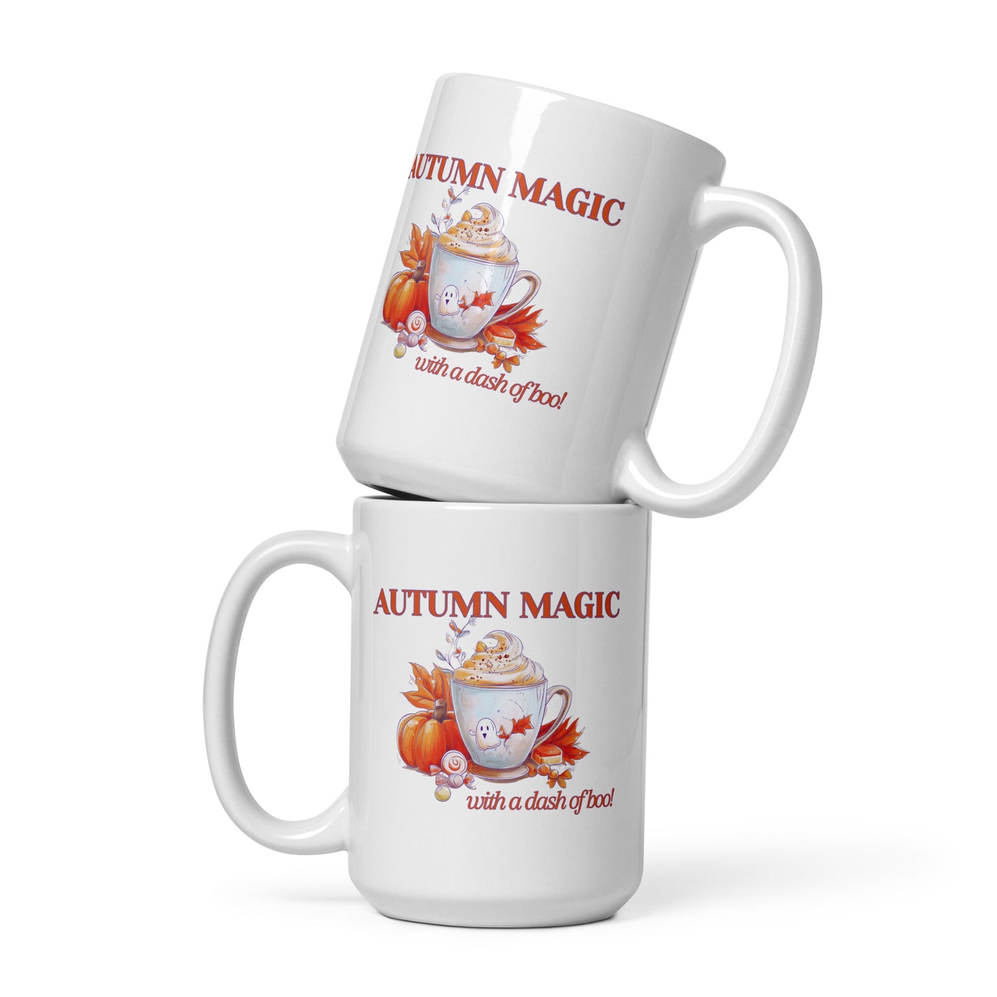 Two stacked white ceramic mugs with a fall-themed autumn graphic. The design features the text 'AUTUMN MAGIC with a dash of boo' in red, alongside illustrations of a pumpkin, orange, maple leaves, and a hot cocoa cup.